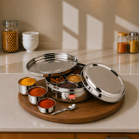 Praylady Food Grade Stainless Steel Elegant Masala Dabba | 7 Cups | 1 Spoon | 1 Airtight Steel Lid | Secure-Fit Steel Lid | 24 CM